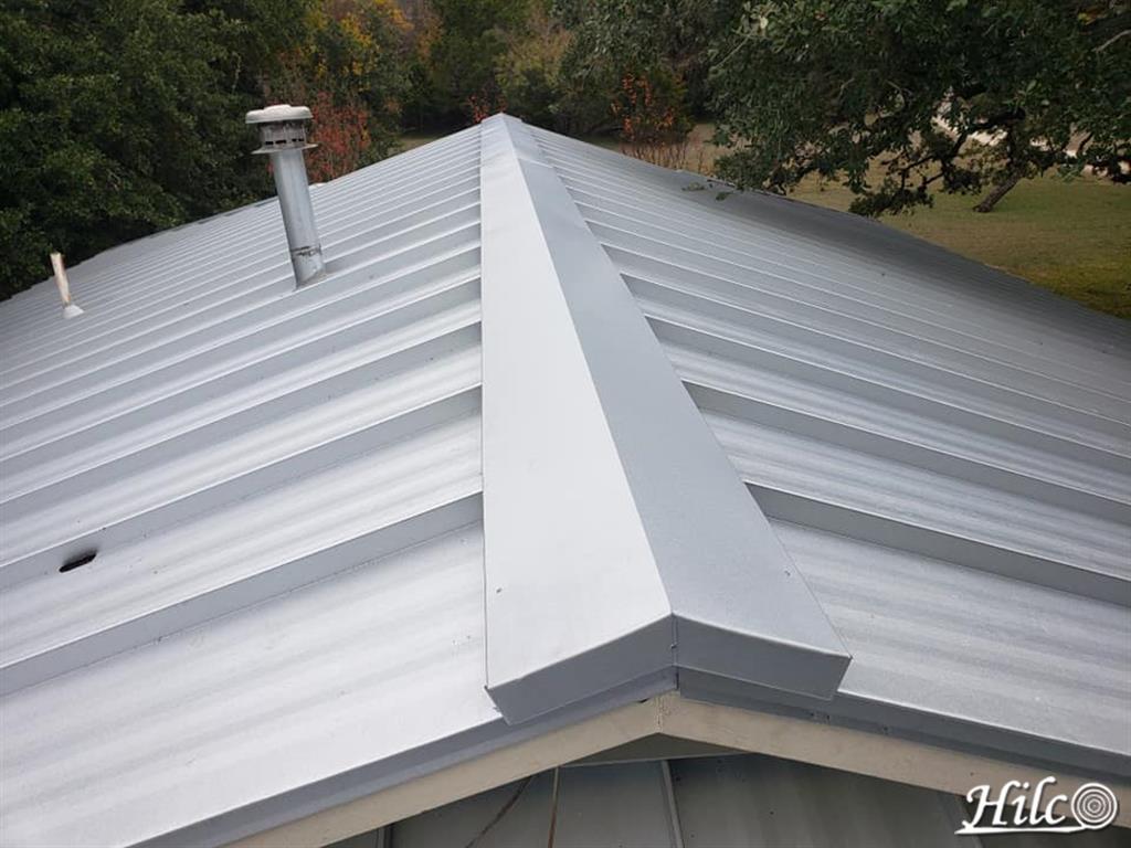 Light ash gray metal roof ridge