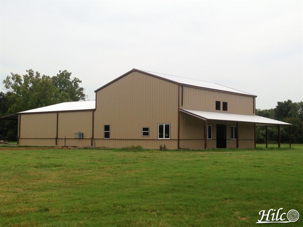 Completed Multi-Height Metal Building with Covered Porch