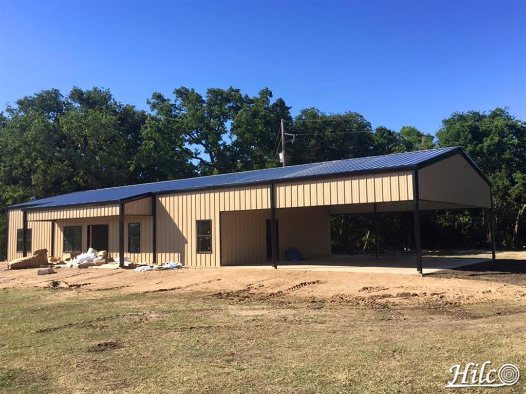 Large Metal Building with Covered Drive / Carport / Porte Cochere